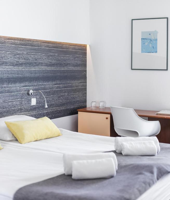 Posteľ alebo postele v izbe v ubytovaní Hotel Punta