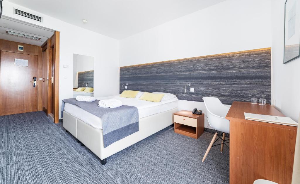 Posteľ alebo postele v izbe v ubytovaní Hotel Punta