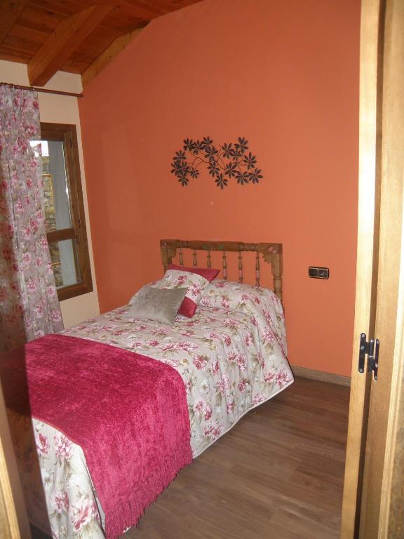 Postel nebo postele na pokoji v ubytování Casa Cosculluela