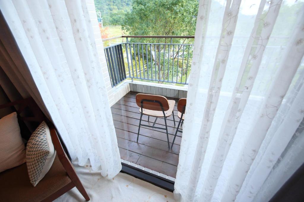Balkón nebo terasa v ubytování Chuying Sunrise B&B