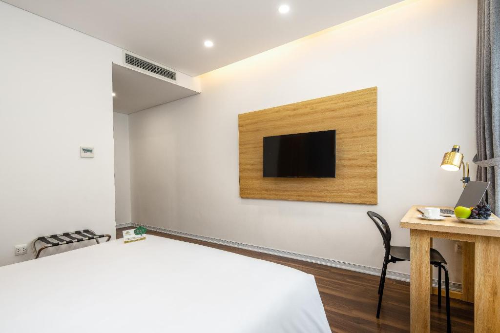 TV/trung tâm giải trí tại Magnolia Hotel