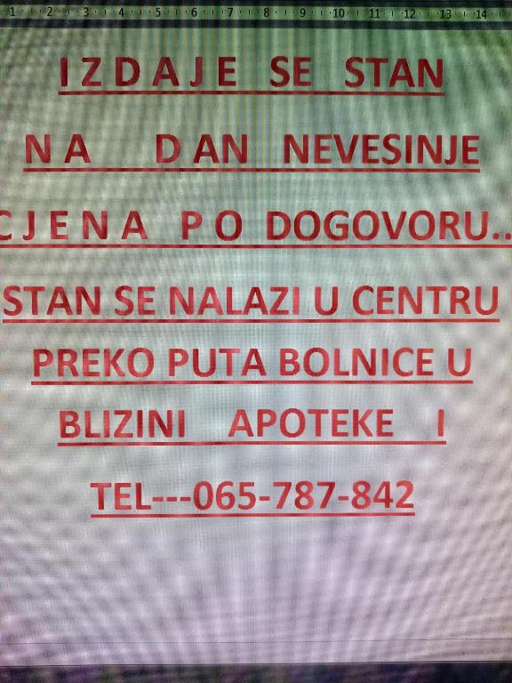 a sign with the names of different languages at Prenoćiste Nevesinje in Nevesinje