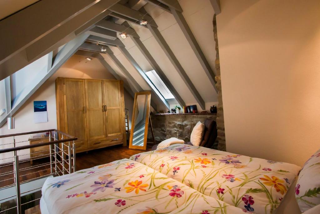 Postel nebo postele na pokoji v ubytování Tauber Relax Loft