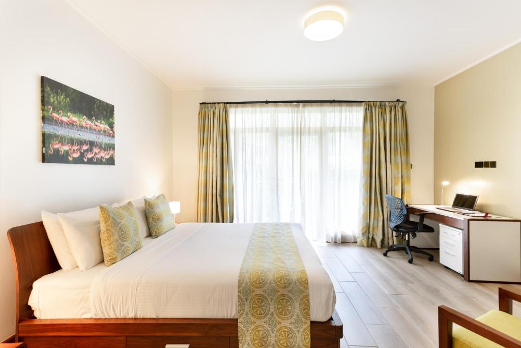 Postel nebo postele na pokoji v ubytování Executive Residency by Best Western Nairobi