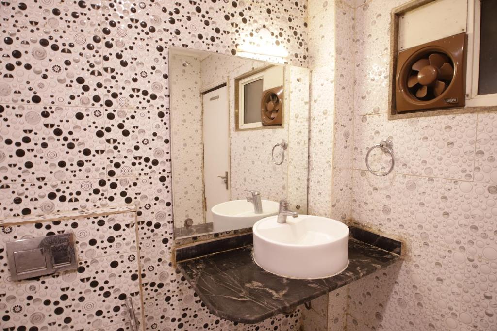 Koupelna v ubytování Hotel Golden Wings