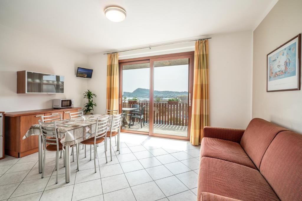Kuchyň nebo kuchyňský kout v ubytování Onda Blu Resort