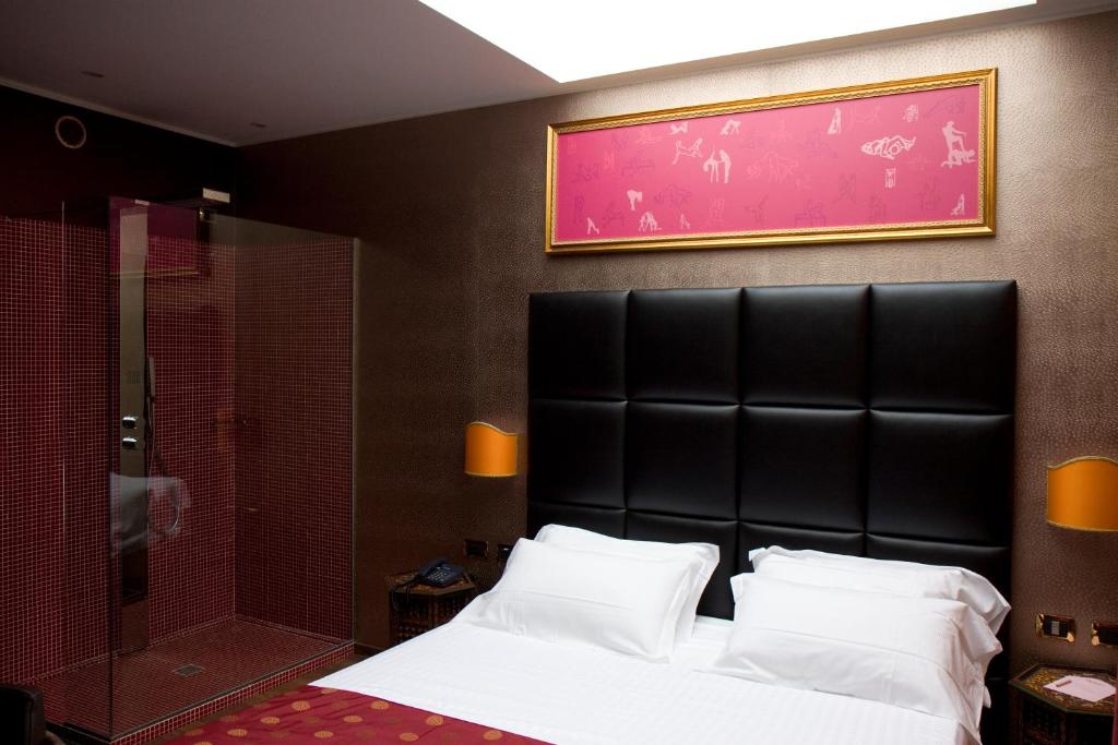 Postel nebo postele na pokoji v ubytování HM MotelHotel