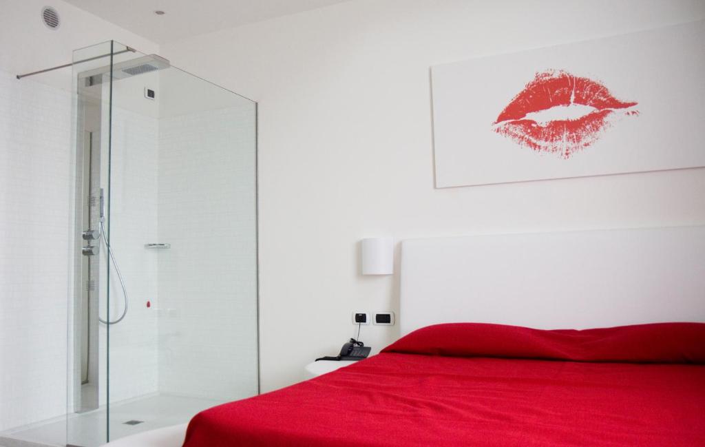 Postel nebo postele na pokoji v ubytování HM MotelHotel