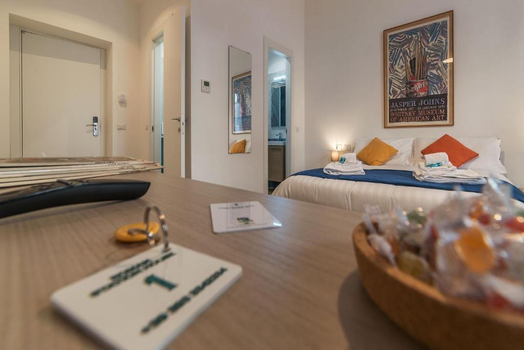 A bed or beds in a room at Roman Station House