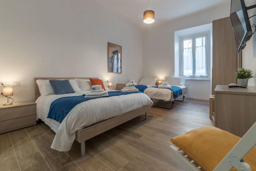 A bed or beds in a room at Roman Station House