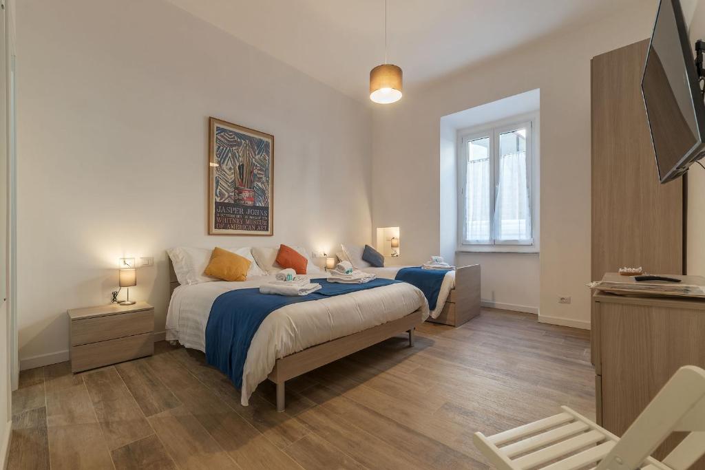 A bed or beds in a room at Roman Station House