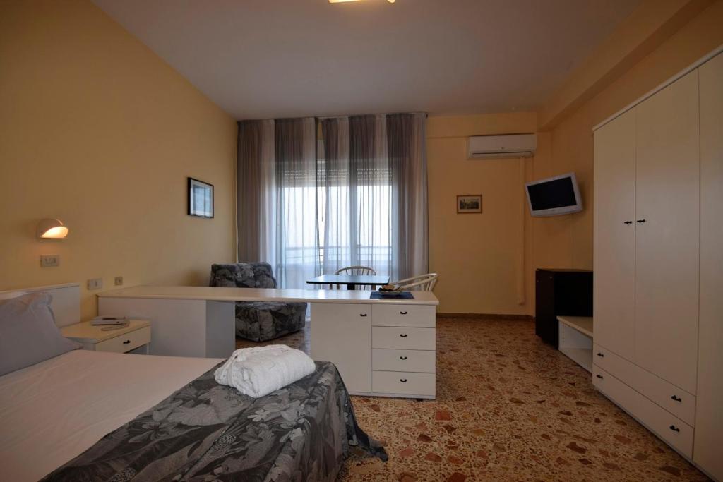 Postel nebo postele na pokoji v ubytování Hotel David