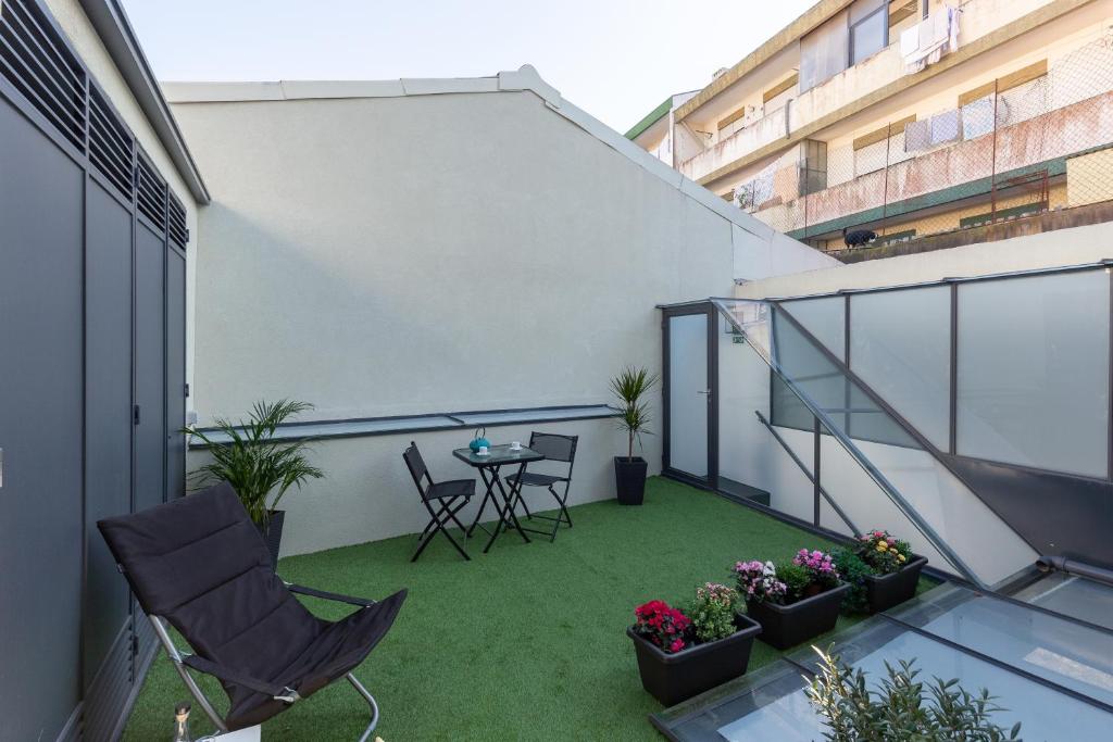 Uma varanda ou terraço em Serra do Pilar Porto Suites