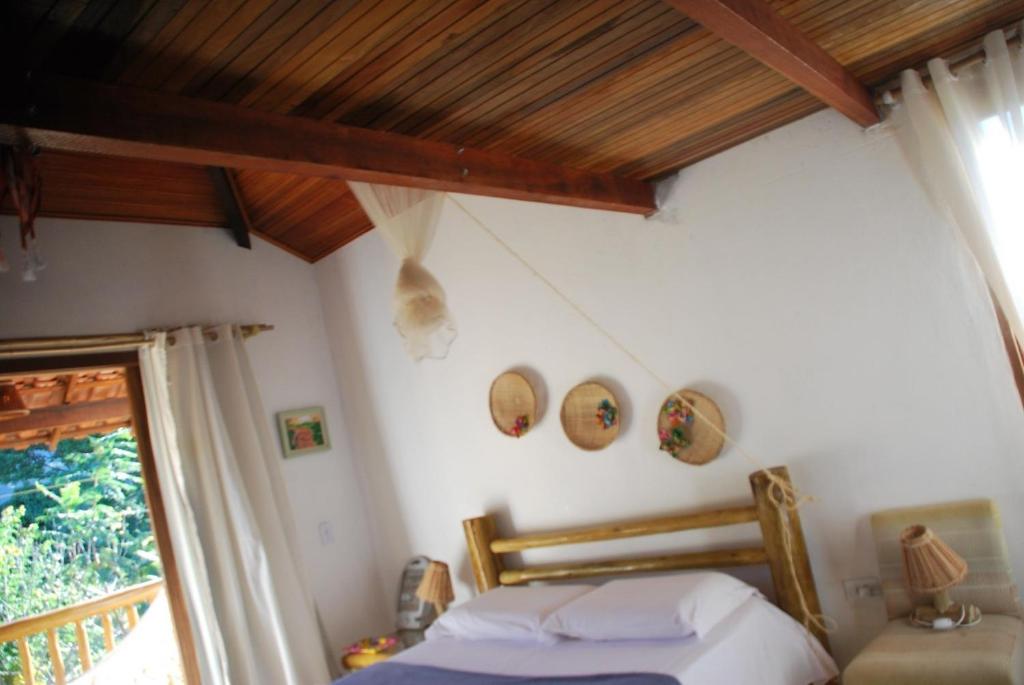 Postel nebo postele na pokoji v ubytování Casa do Capão