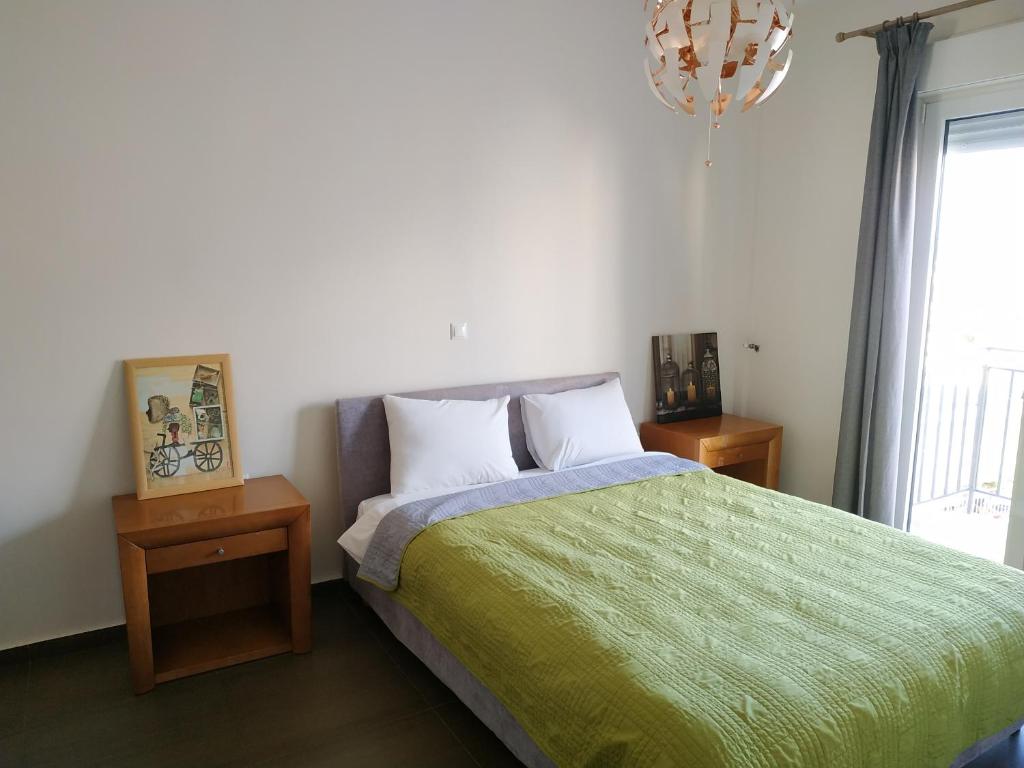 En eller flere senge i et værelse på Pantazopoulou square apartment (central railway)