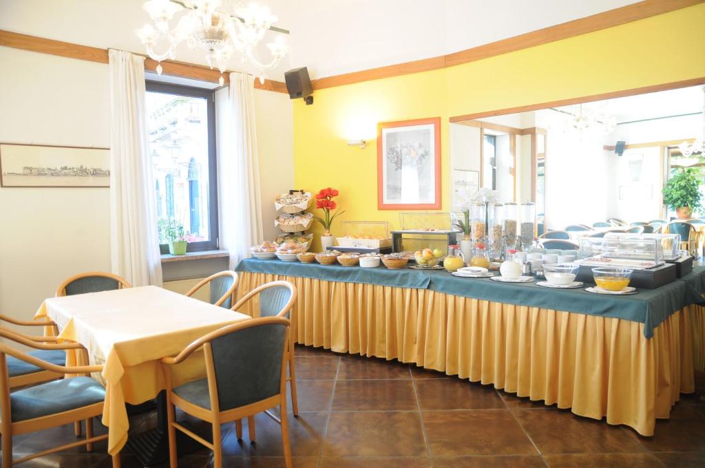 Posezení v ubytování Hotel Italie et Suisse