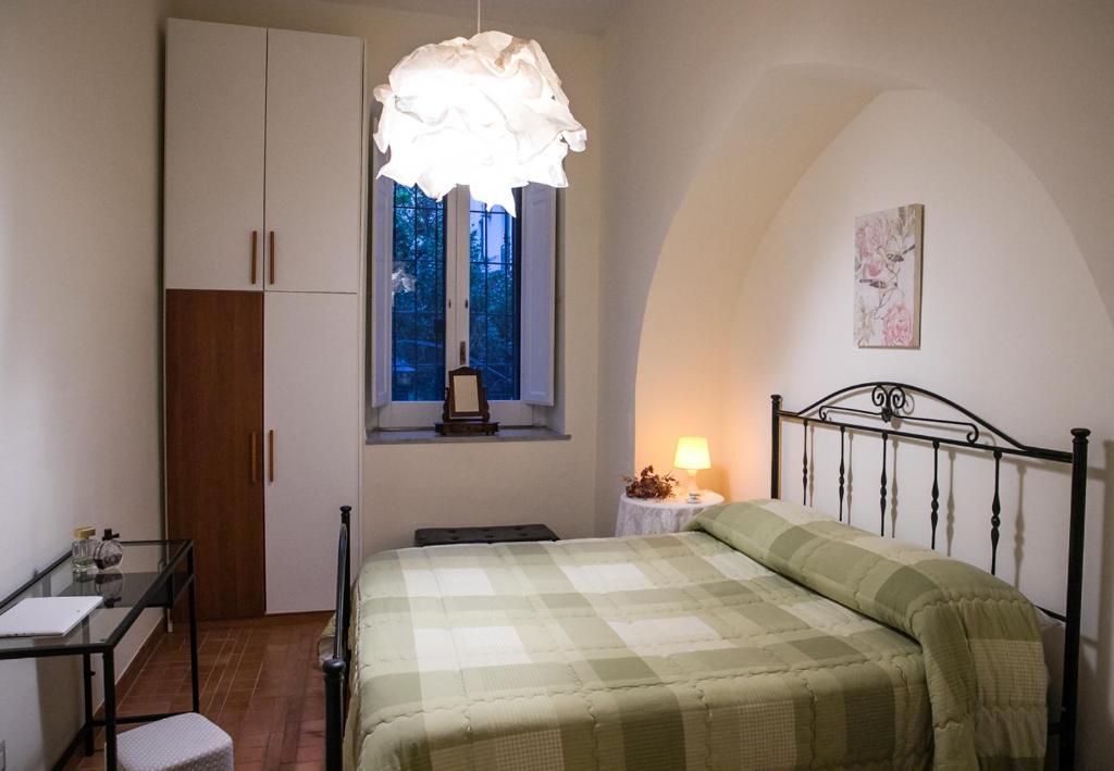 A bed or beds in a room at Il Normanno Home