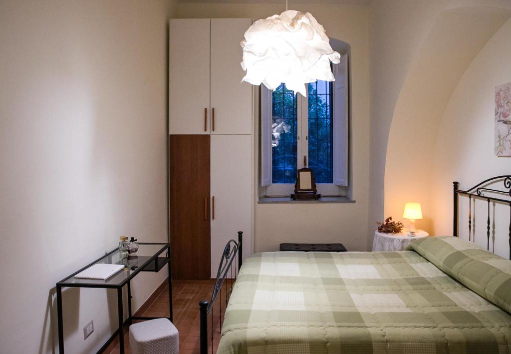 A bed or beds in a room at Il Normanno Home