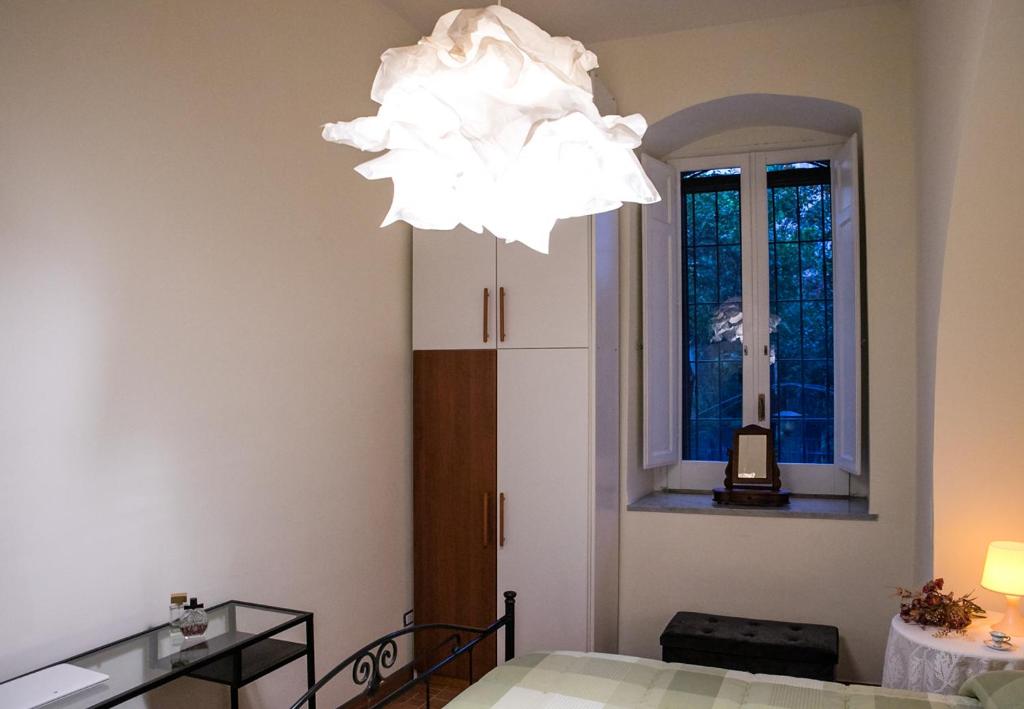 A bed or beds in a room at Il Normanno Home