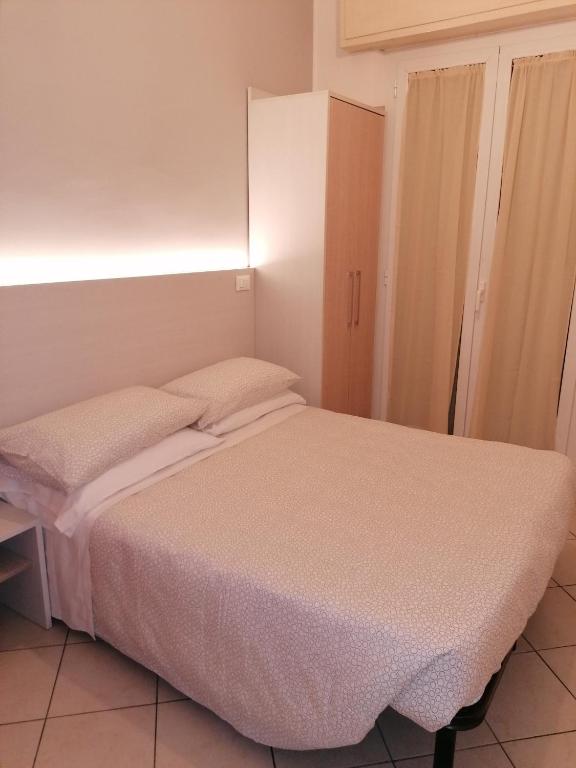 Postel nebo postele na pokoji v ubytování HOTEL ANDREA'S