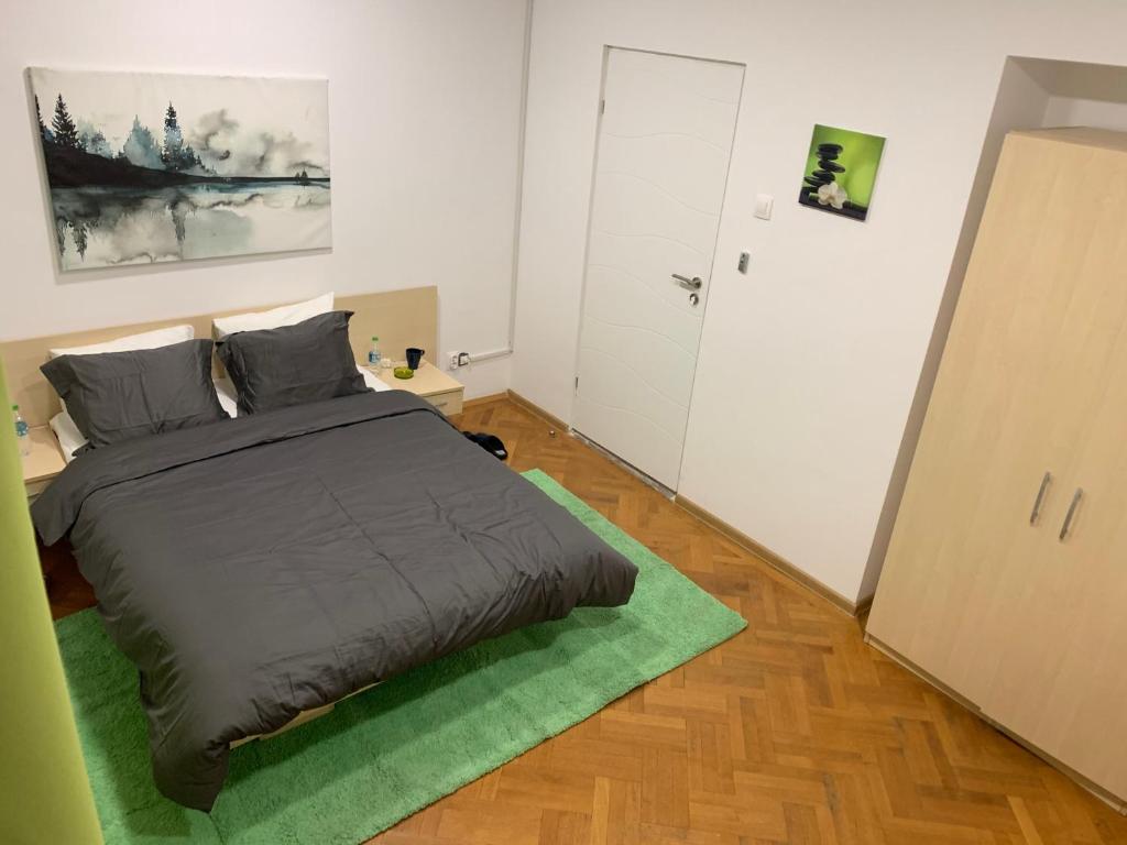 Postel nebo postele na pokoji v ubytování Bucarest B&B