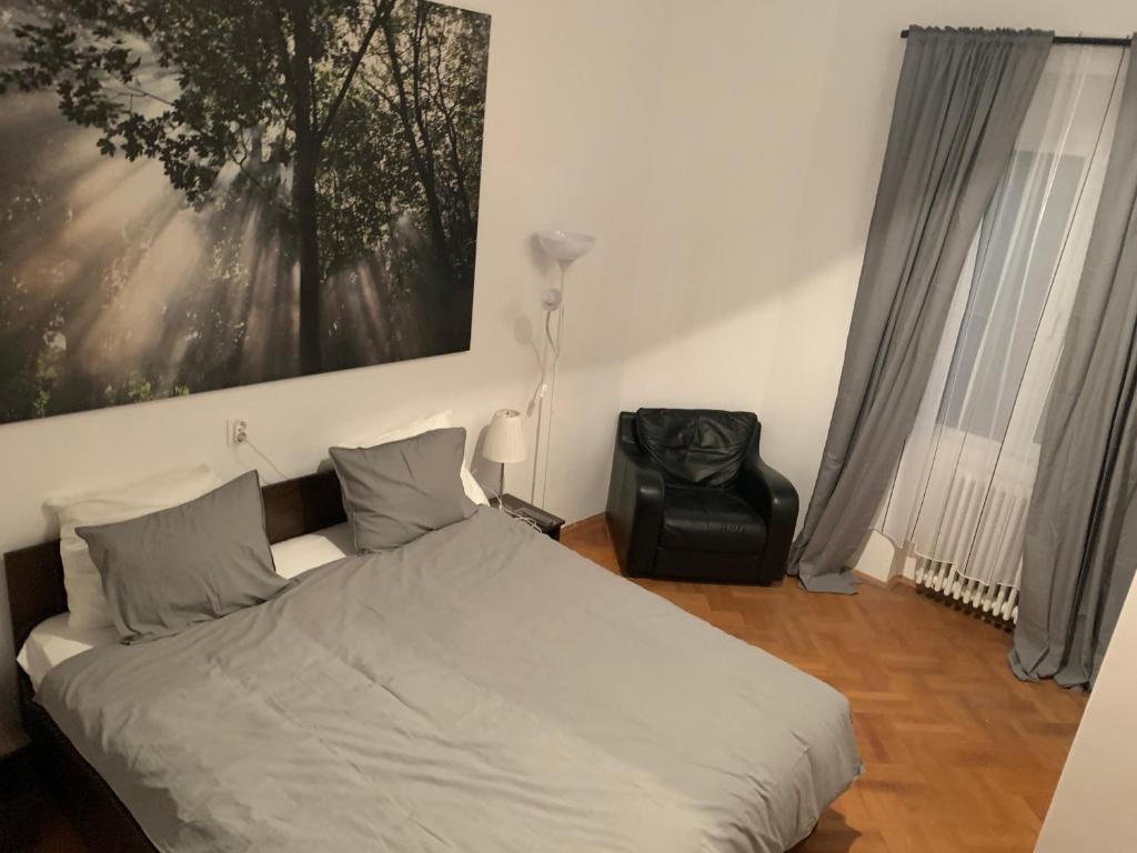 Postel nebo postele na pokoji v ubytování Bucarest B&B