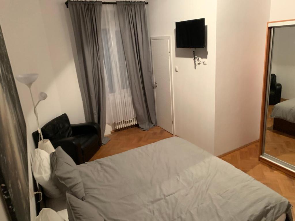 Postel nebo postele na pokoji v ubytování Bucarest B&B