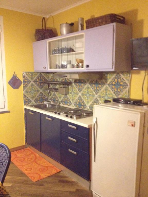 Kuchyň nebo kuchyňský kout v ubytování la terrazza