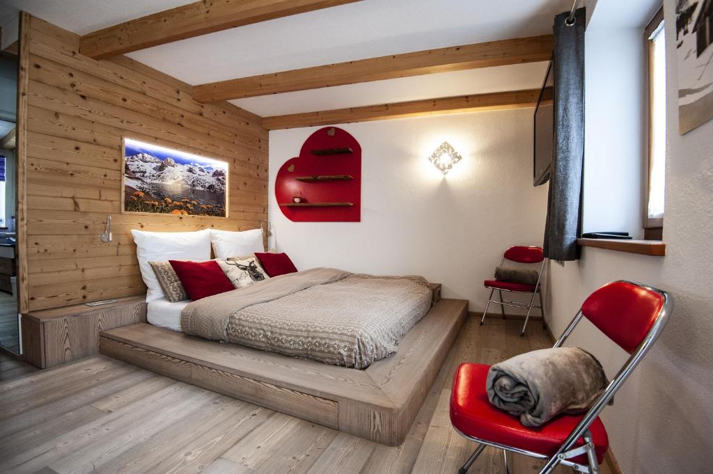 Posteľ alebo postele v izbe v ubytovaní Chalet Tobià