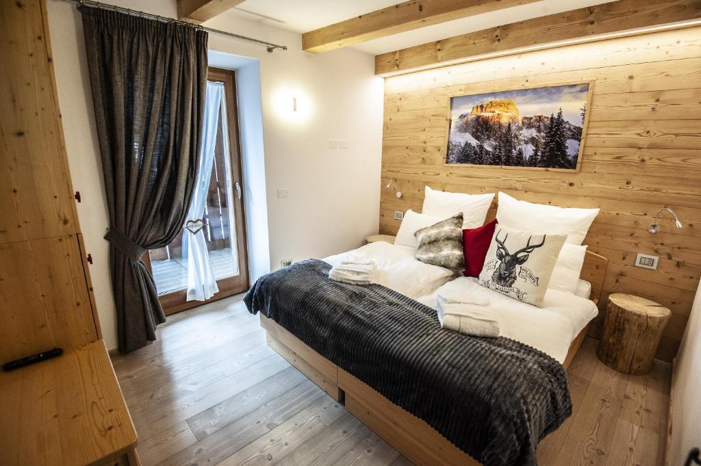 Posteľ alebo postele v izbe v ubytovaní Chalet Tobià