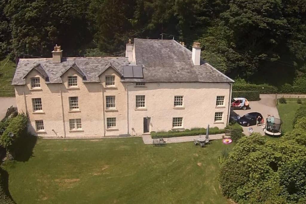 an aerial view of a large house with a yard at Plas yn Yale with mountain views from all windows in Wrexham