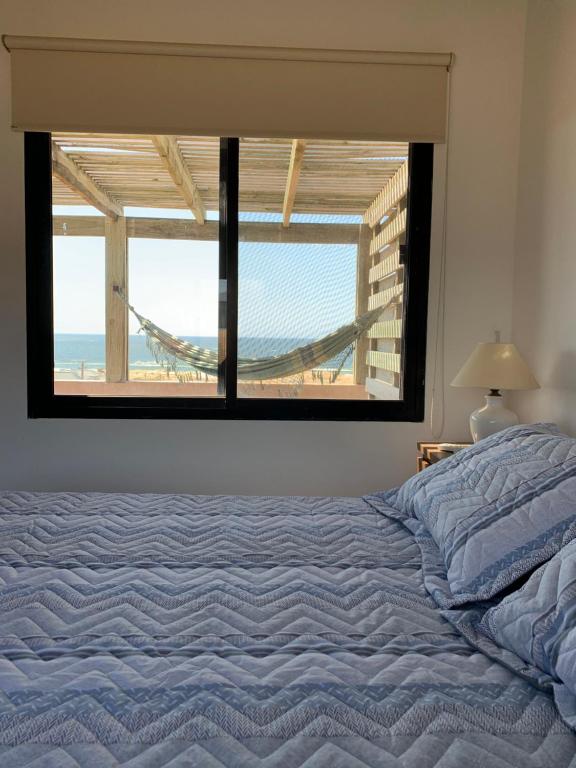 Una cama o camas en una habitación de Colina D' Ousa