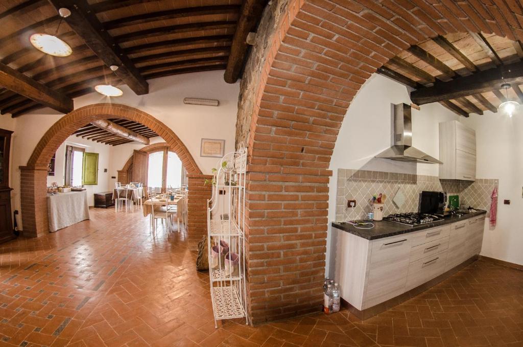 Kuchyň nebo kuchyňský kout v ubytování Agriturismo podere Casano