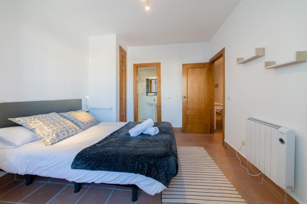 Posteľ alebo postele v izbe v ubytovaní Bed and Snow Apartments