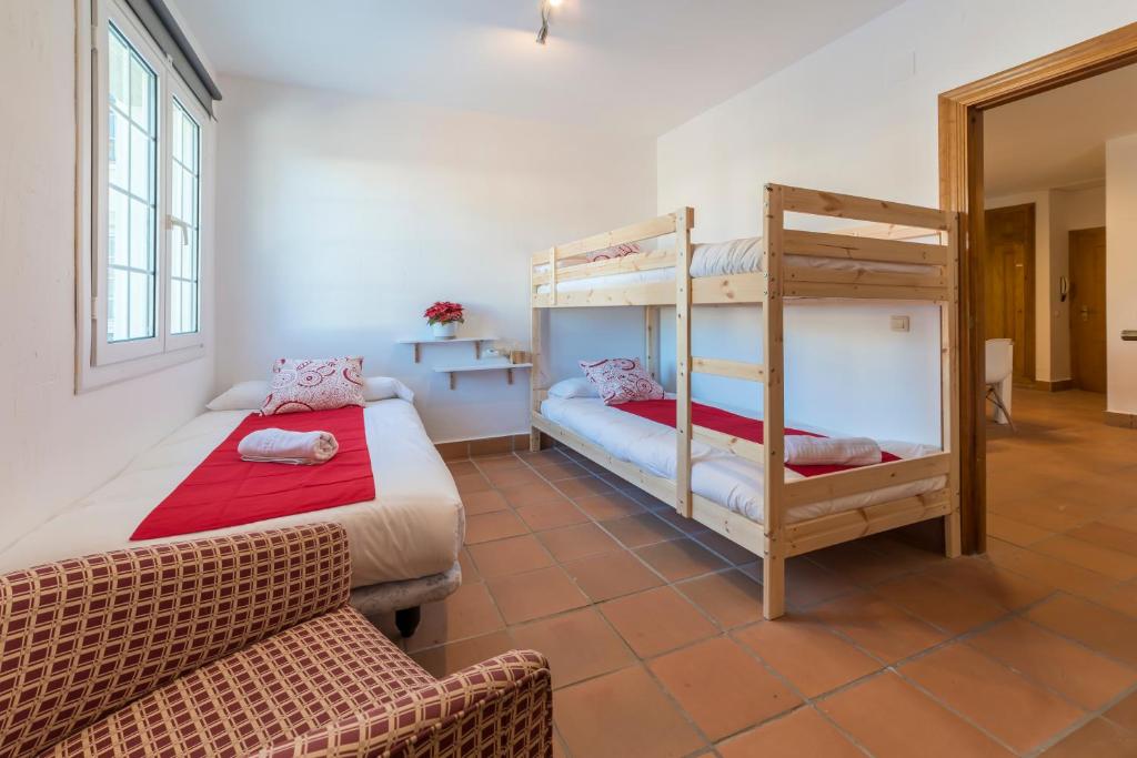 Posteľ alebo postele v izbe v ubytovaní Bed and Snow Apartments