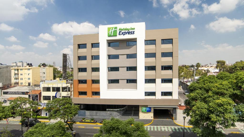 a building with a sign on the side of it at Holiday Inn Express - Mexico Basilica, an IHG Hotel in Mexico City