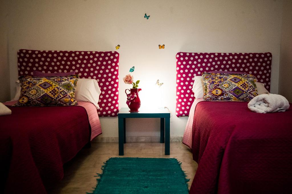 Postel nebo postele na pokoji v ubytování La Flamenka Hostel