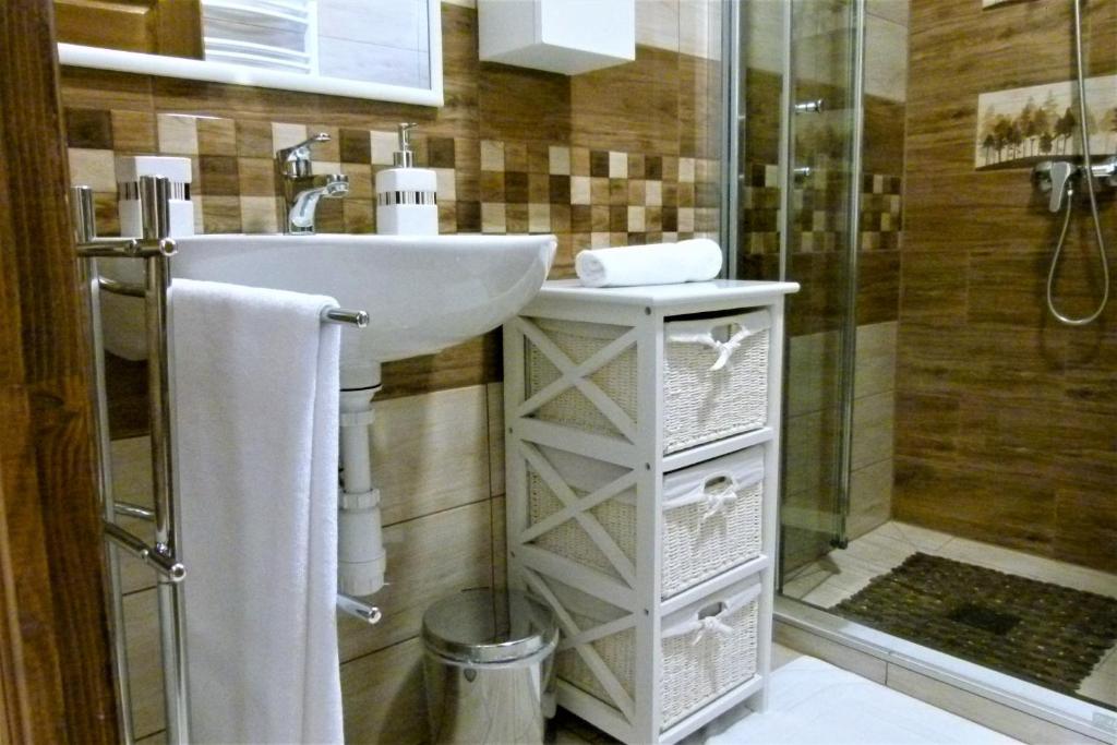 Koupelna v ubytování Wolf House Apartman