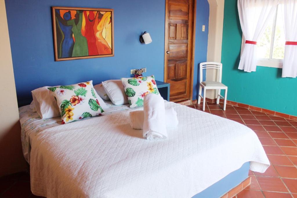 Postel nebo postele na pokoji v ubytování Casa Amarilla