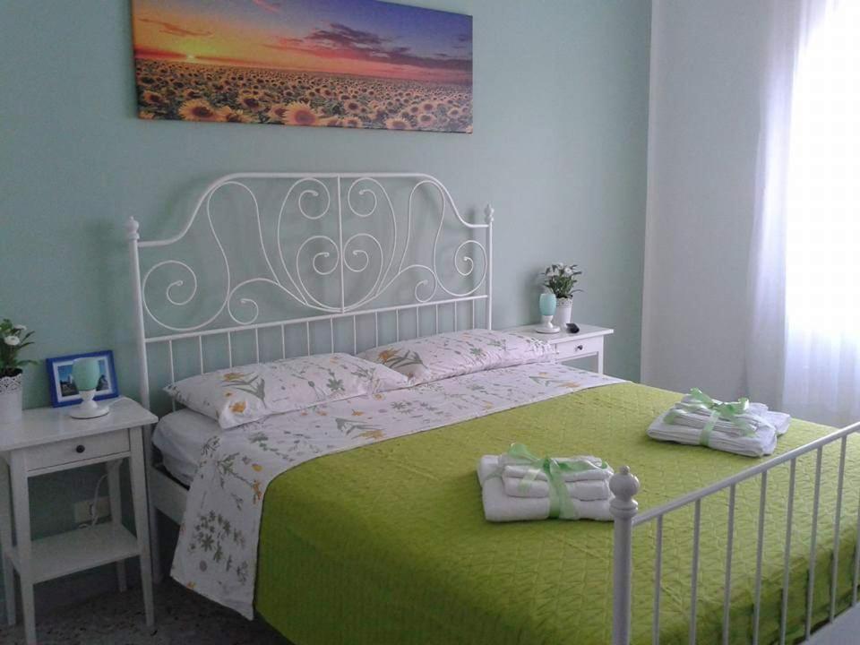 Ένα ή περισσότερα κρεβάτια σε δωμάτιο στο CASA VACANZE I BIGIONI