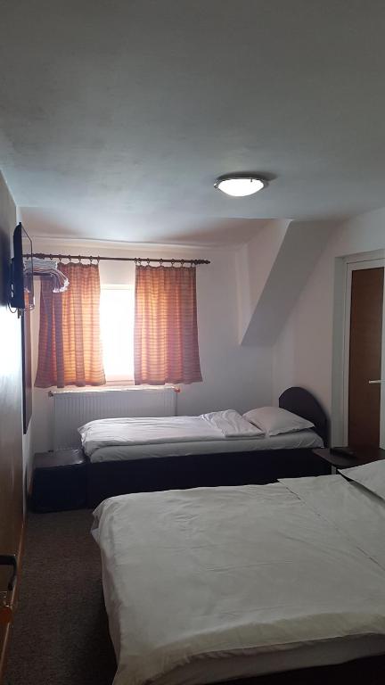 Säng eller sängar i ett rum på Vila MDM