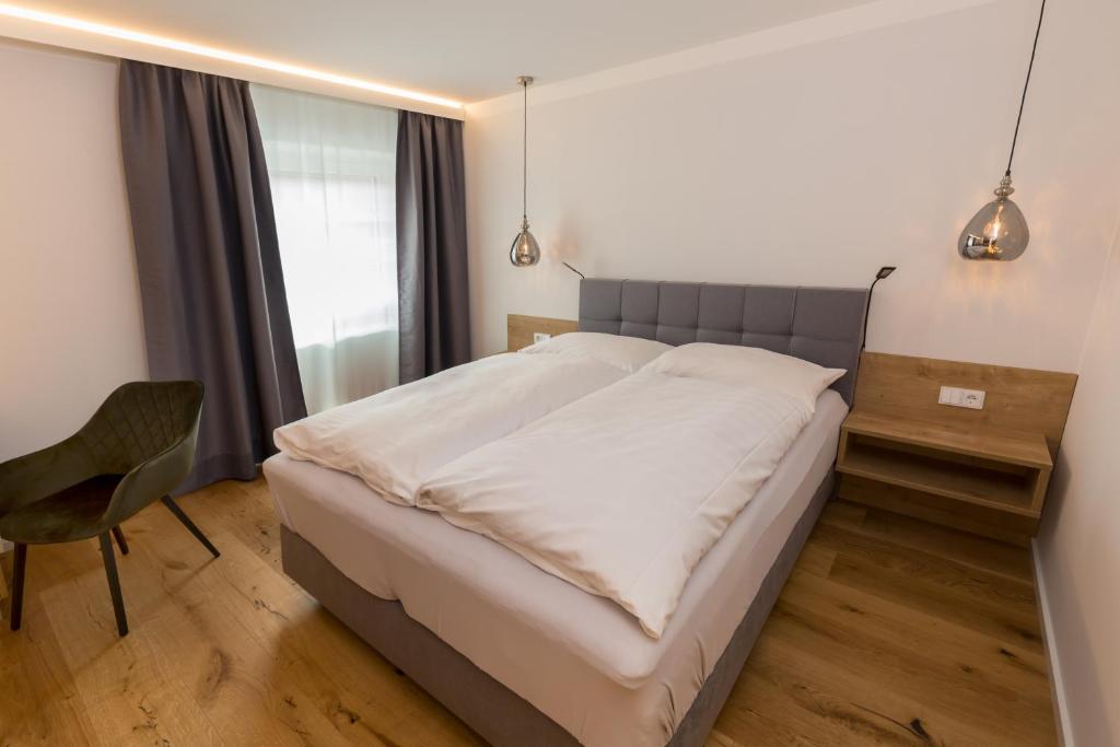 Letto o letti in una camera di Gasthof Fischer Dörnbach