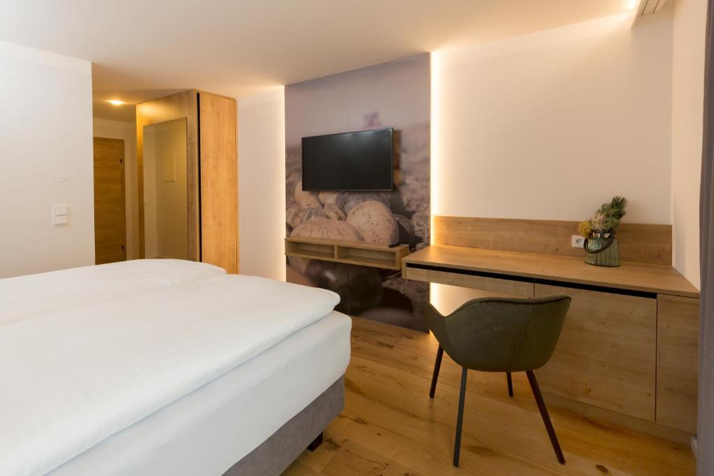 Letto o letti in una camera di Gasthof Fischer Dörnbach