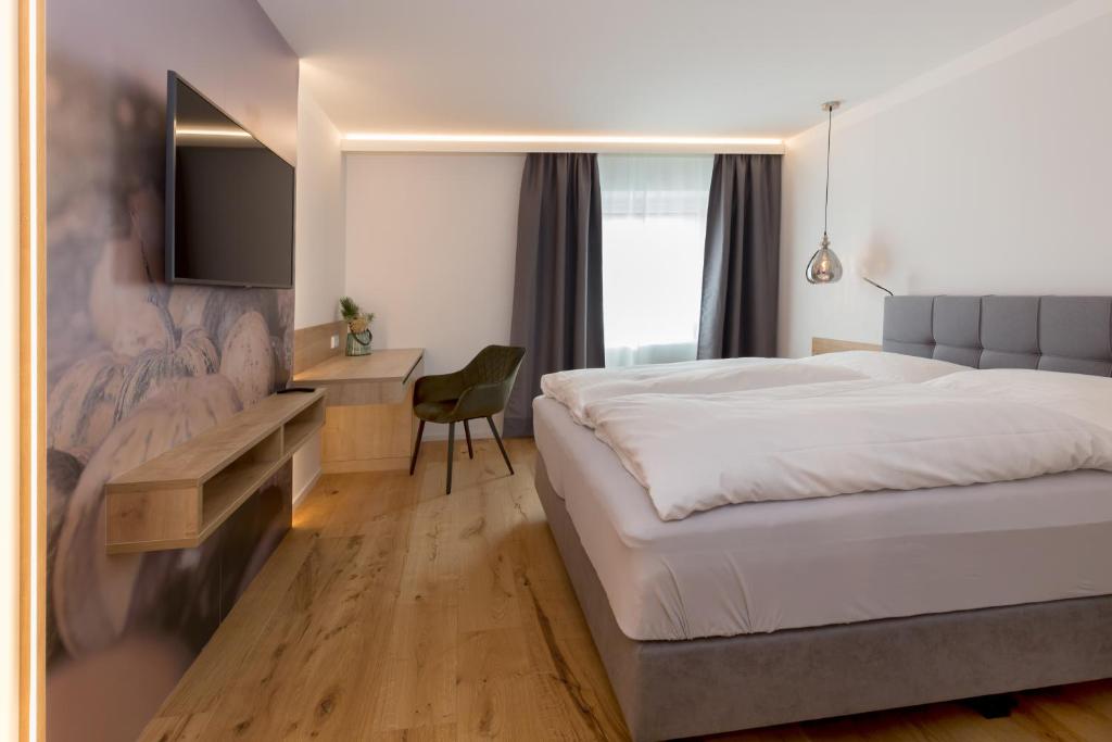 Letto o letti in una camera di Gasthof Fischer Dörnbach