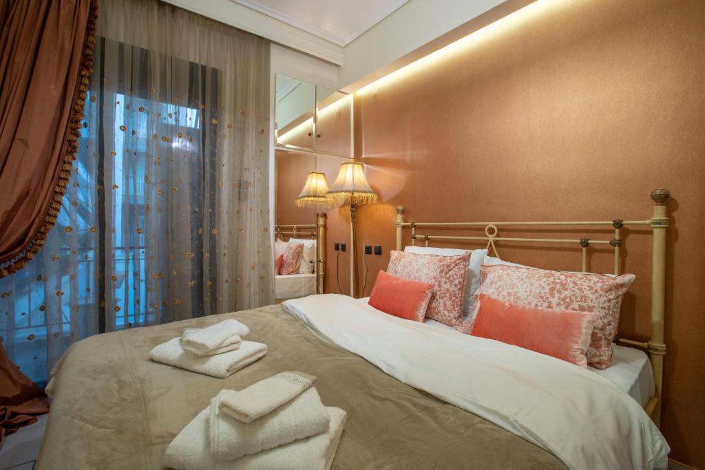 Ένα ή περισσότερα κρεβάτια σε δωμάτιο στο Volos Center Luxury Home