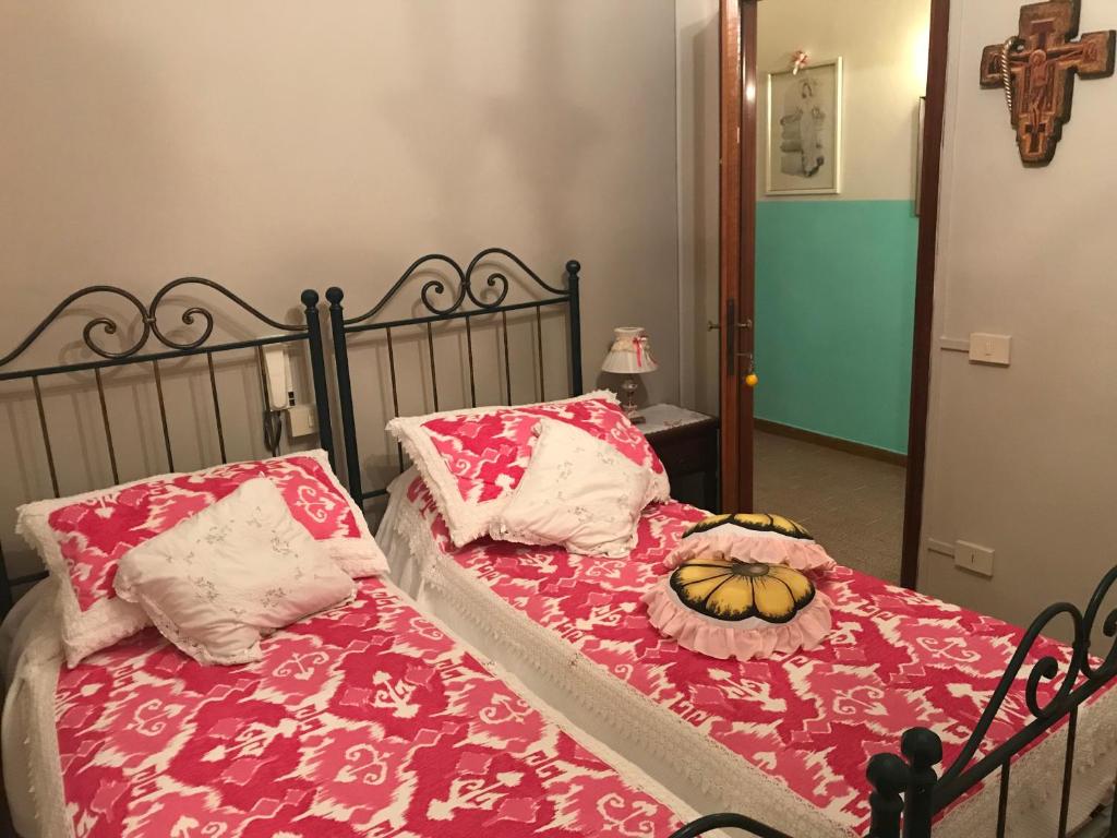 Łóżko lub łóżka w pokoju w obiekcie Affittacamere San Marco