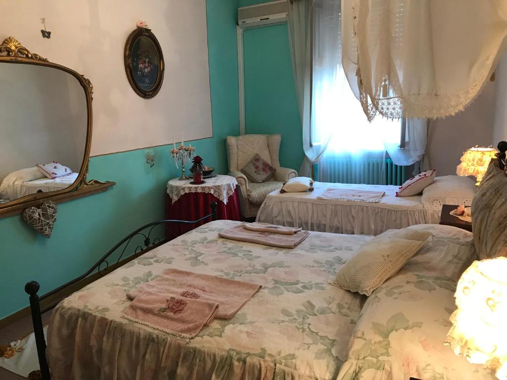 Łóżko lub łóżka w pokoju w obiekcie Affittacamere San Marco