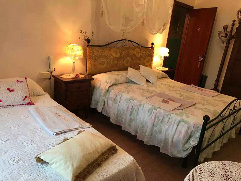 Łóżko lub łóżka w pokoju w obiekcie Affittacamere San Marco
