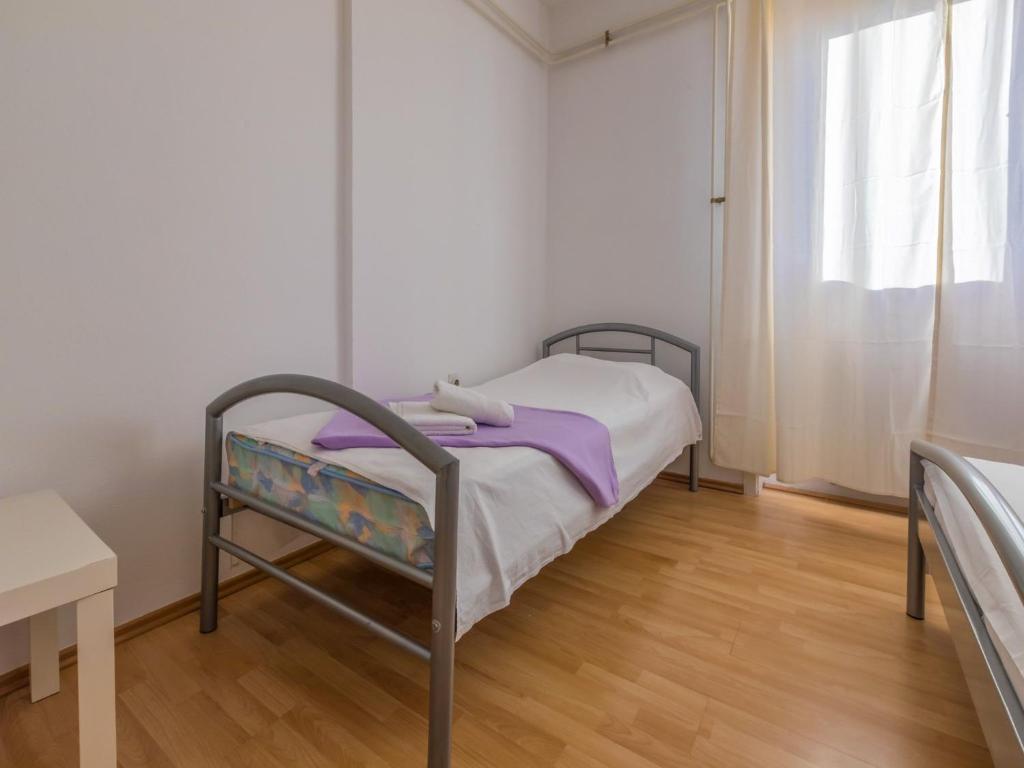 Postel nebo postele na pokoji v ubytování Apartment Roni