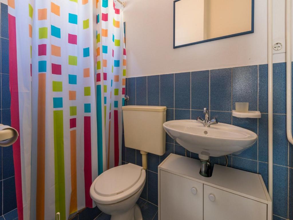 Koupelna v ubytování Apartment Roni
